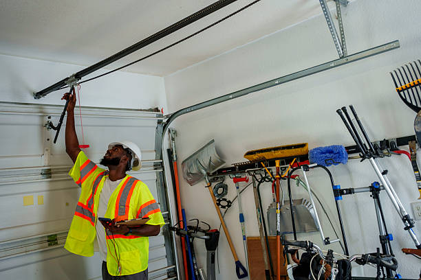 Professional Garage Door Panel Replacement technician working in St. Lawrence County County, NY